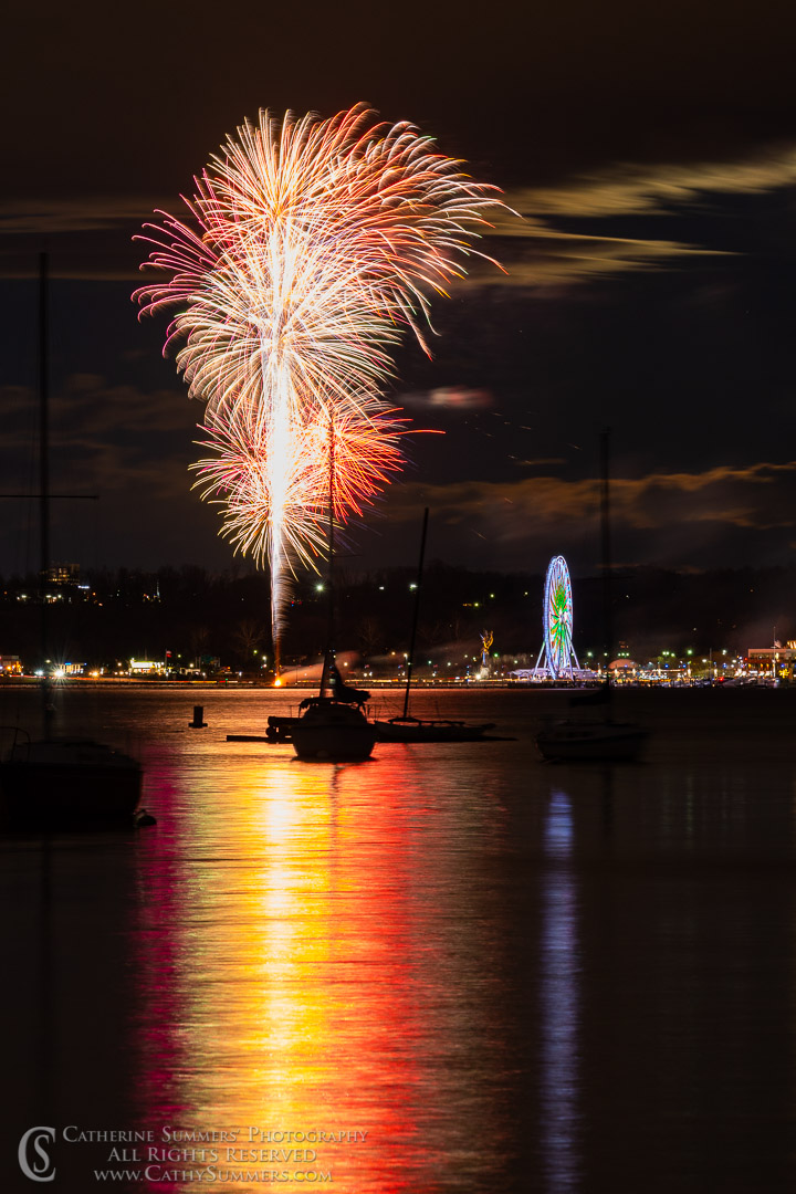 National Harbor Ferris Wheel and Fireworks with Reflections in the Potomac River