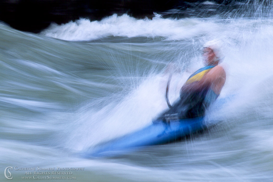 Using a slow shutter speed to blur the water and canoeist surfing the O'deck Wave, #1: Great Falls National Park, Virginia
