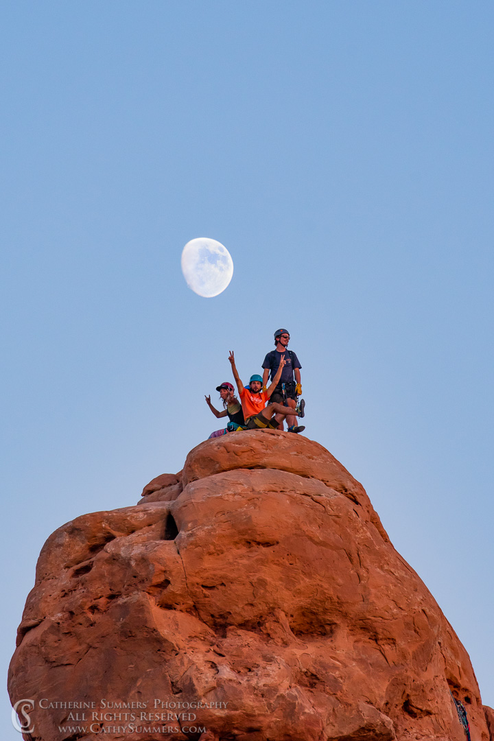 Moon and Climbers: Arches National Park