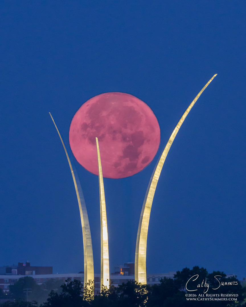 Buck Moon Setting Behinfd the Air Force Memorial on a Smoky Morning - Composite Image